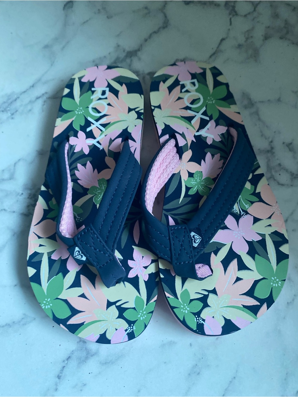 Roxy Girls' Floral Navy Flip Flops with Pink & Green Accents